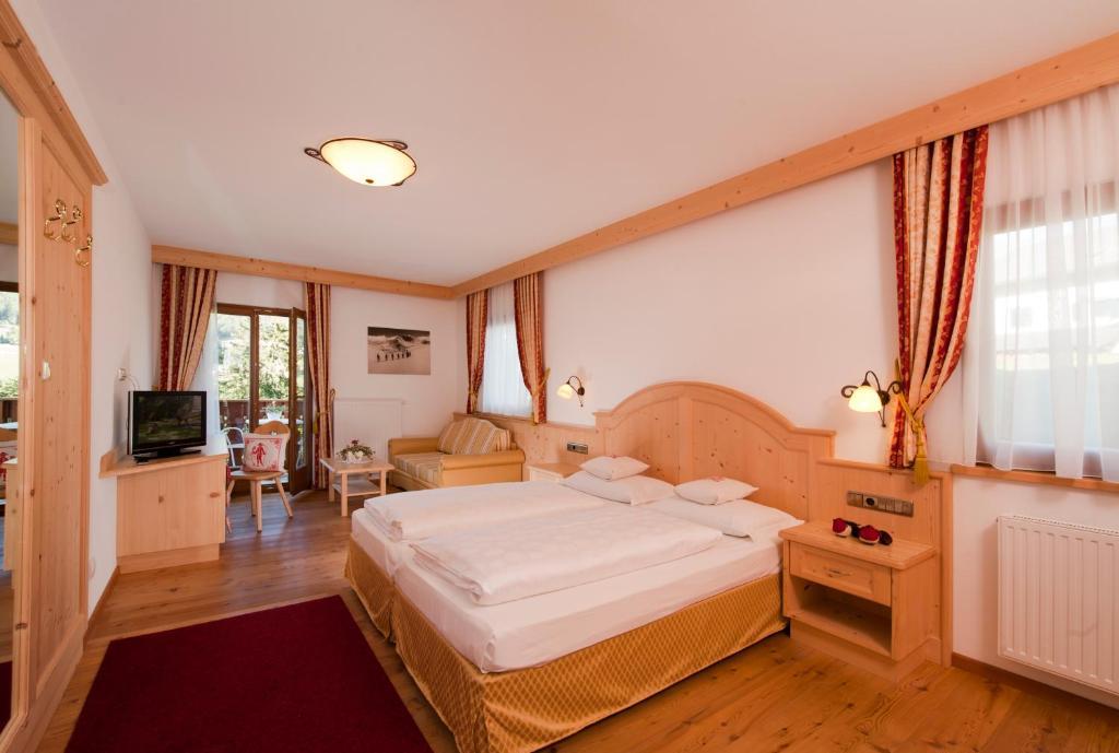 Hotel Digon Ortisei Pokoj fotografie